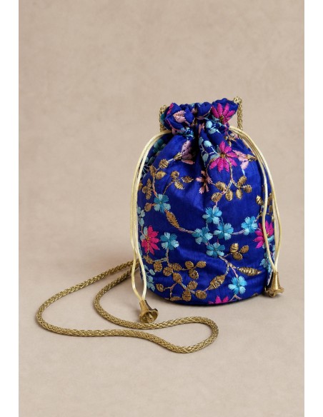 Bombonera azul royal con bordado floral | Complementos Invitada